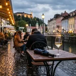 What to wear in Ljubljana in September: riverside café outfit after rain